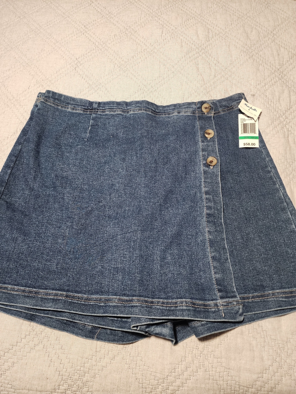 High-Rise Blue Denim Mini Skirt with Button-Front Detail